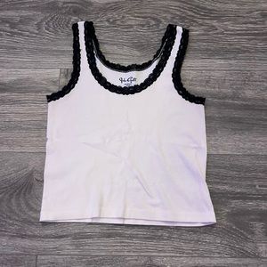 Brandy Melville pink and black laced tank top.